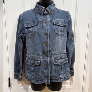 Maurice’s denim jean jacket with an adjustable waist, and button closure.